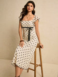 Poéselle Women's Fitted Midi Polka Dot Dress With Square Neck Short Sleeves And Zipper Detail Elegant Apricot Knitted Fabric